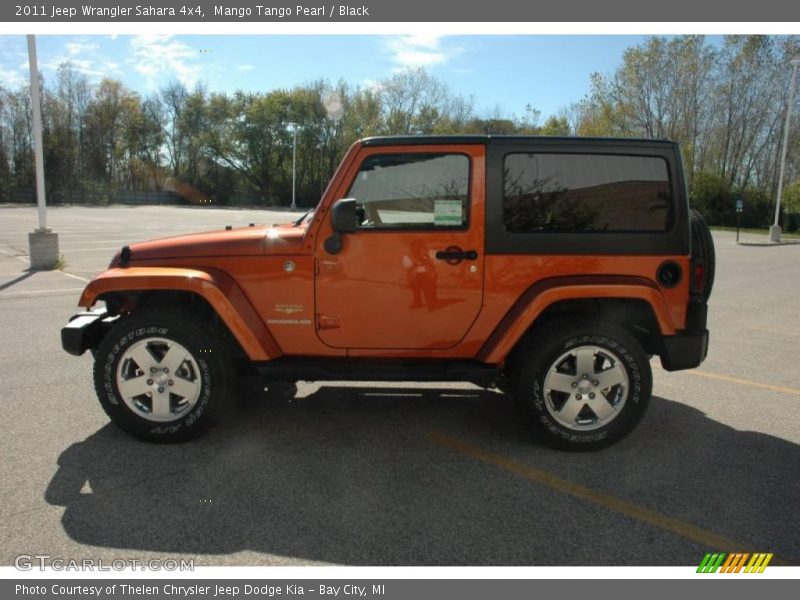 Mango Tango Pearl / Black 2011 Jeep Wrangler Sahara 4x4