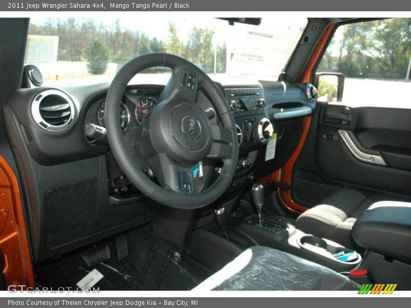 Mango Tango Pearl / Black 2011 Jeep Wrangler Sahara 4x4