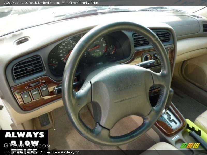 White Frost Pearl / Beige 2001 Subaru Outback Limited Sedan
