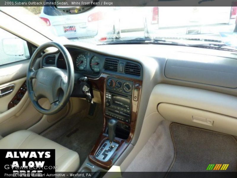 White Frost Pearl / Beige 2001 Subaru Outback Limited Sedan