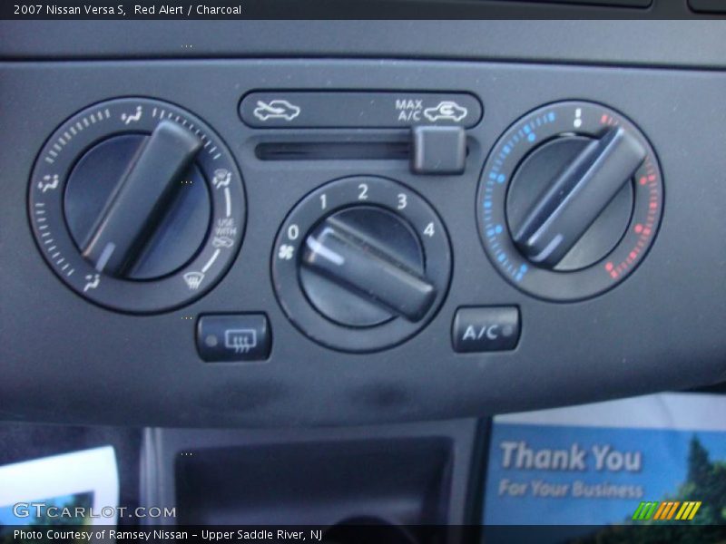 Red Alert / Charcoal 2007 Nissan Versa S