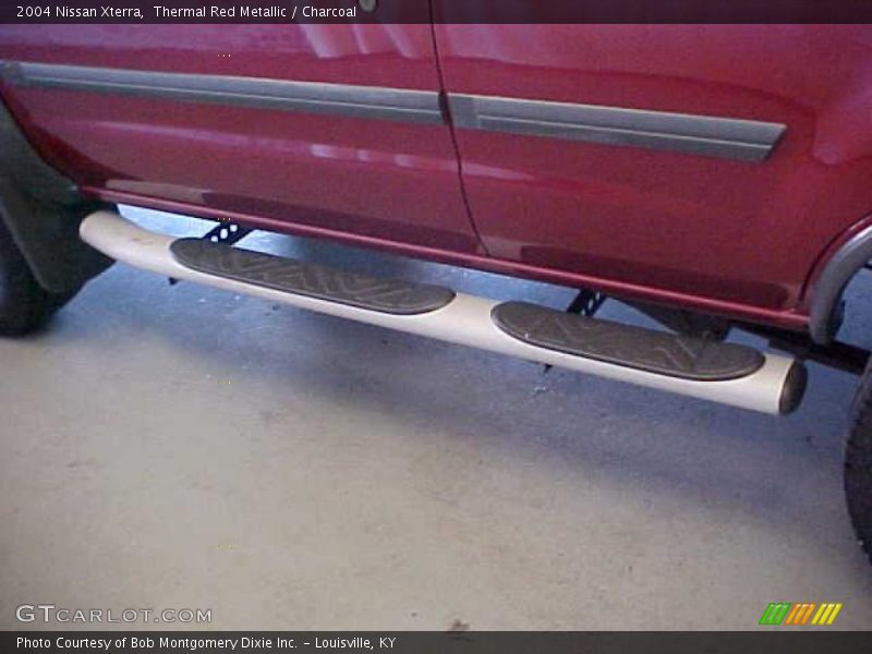 Thermal Red Metallic / Charcoal 2004 Nissan Xterra