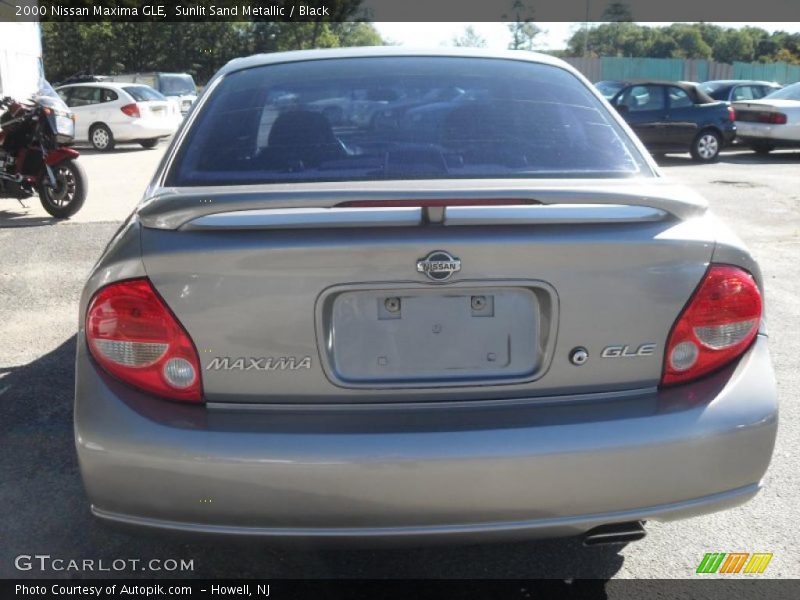Sunlit Sand Metallic / Black 2000 Nissan Maxima GLE