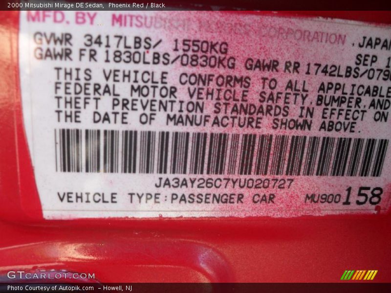 Phoenix Red / Black 2000 Mitsubishi Mirage DE Sedan