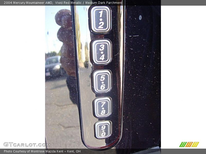 Vivid Red Metallic / Medium Dark Parchment 2004 Mercury Mountaineer AWD