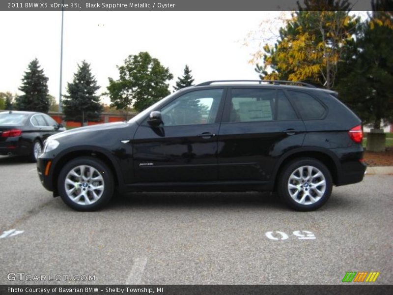 Black Sapphire Metallic / Oyster 2011 BMW X5 xDrive 35i