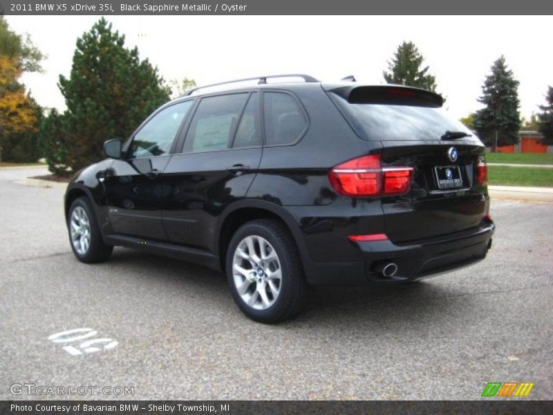 Black Sapphire Metallic / Oyster 2011 BMW X5 xDrive 35i