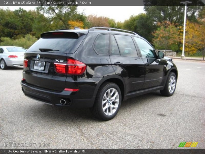 Black Sapphire Metallic / Oyster 2011 BMW X5 xDrive 35i