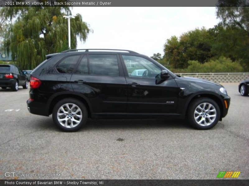 Black Sapphire Metallic / Oyster 2011 BMW X5 xDrive 35i