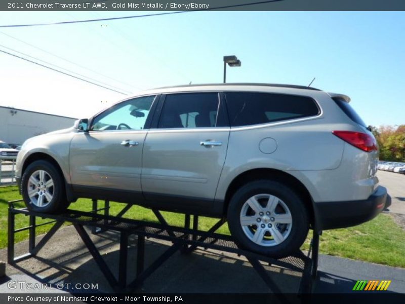 Gold Mist Metallic / Ebony/Ebony 2011 Chevrolet Traverse LT AWD