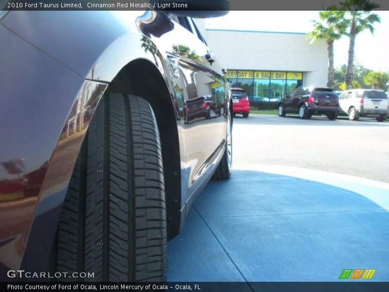 Cinnamon Red Metallic / Light Stone 2010 Ford Taurus Limited