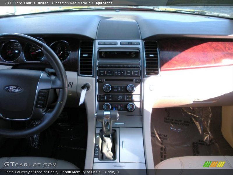 Cinnamon Red Metallic / Light Stone 2010 Ford Taurus Limited