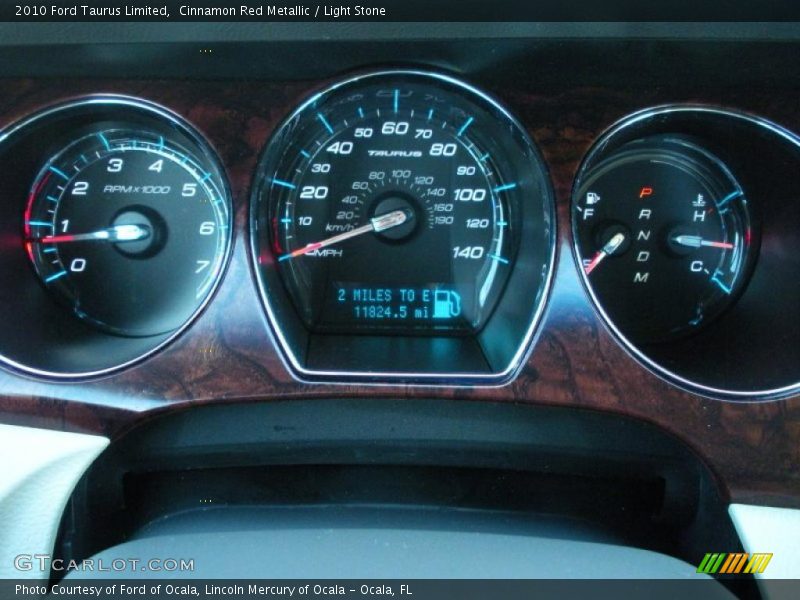 Cinnamon Red Metallic / Light Stone 2010 Ford Taurus Limited