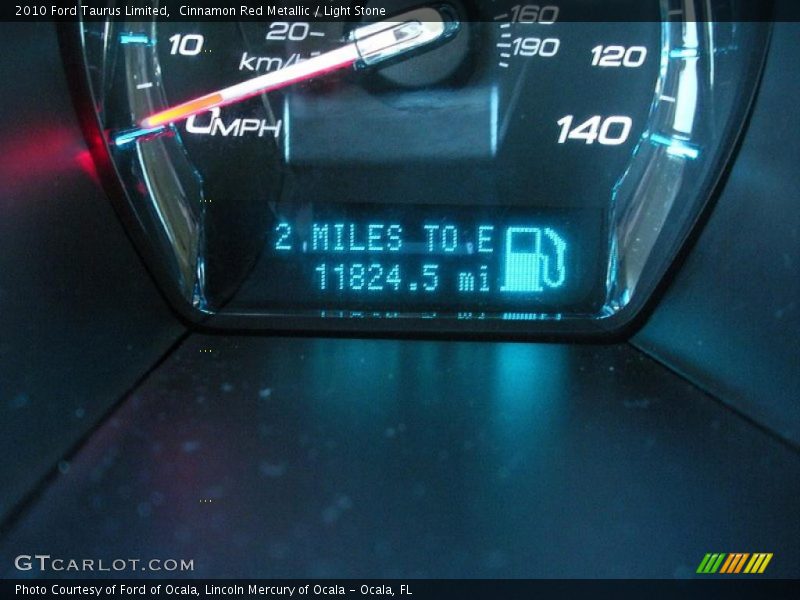 Cinnamon Red Metallic / Light Stone 2010 Ford Taurus Limited