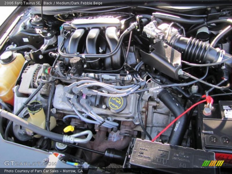 Black / Medium/Dark Pebble Beige 2006 Ford Taurus SE