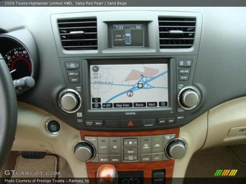 Salsa Red Pearl / Sand Beige 2009 Toyota Highlander Limited 4WD
