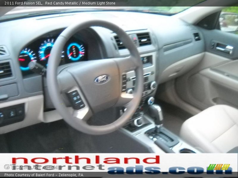 Red Candy Metallic / Medium Light Stone 2011 Ford Fusion SEL