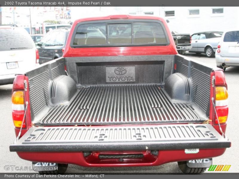 Impulse Red Pearl / Oak 2002 Toyota Tacoma Xtracab 4x4