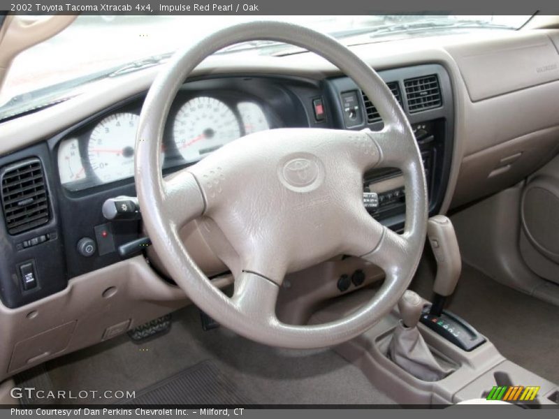 Impulse Red Pearl / Oak 2002 Toyota Tacoma Xtracab 4x4