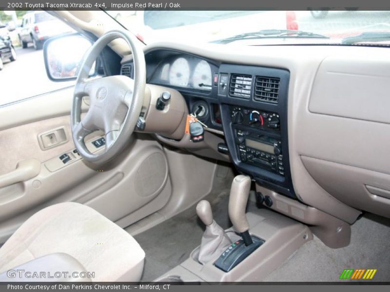 Impulse Red Pearl / Oak 2002 Toyota Tacoma Xtracab 4x4