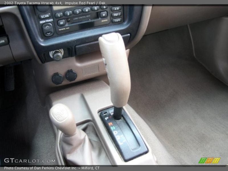 Impulse Red Pearl / Oak 2002 Toyota Tacoma Xtracab 4x4