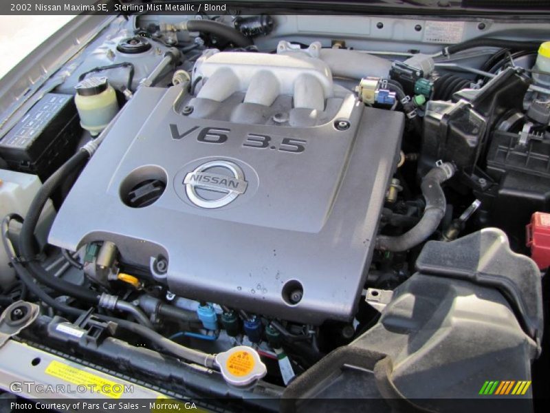 Sterling Mist Metallic / Blond 2002 Nissan Maxima SE