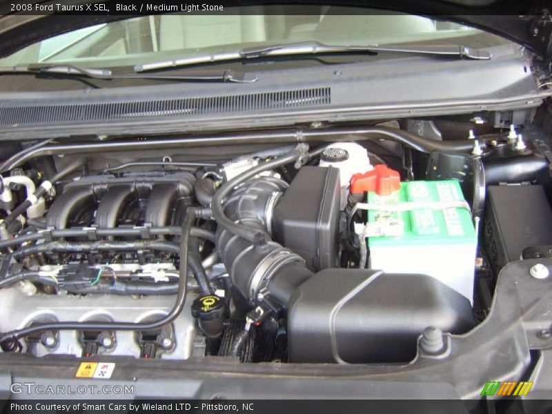 Black / Medium Light Stone 2008 Ford Taurus X SEL
