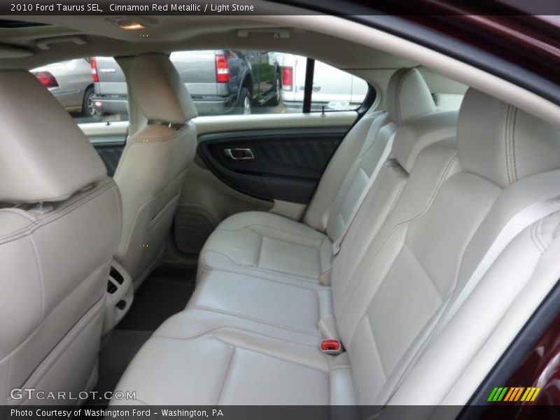 Cinnamon Red Metallic / Light Stone 2010 Ford Taurus SEL