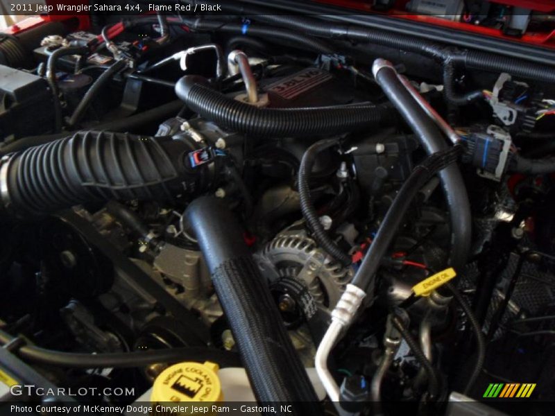 Flame Red / Black 2011 Jeep Wrangler Sahara 4x4