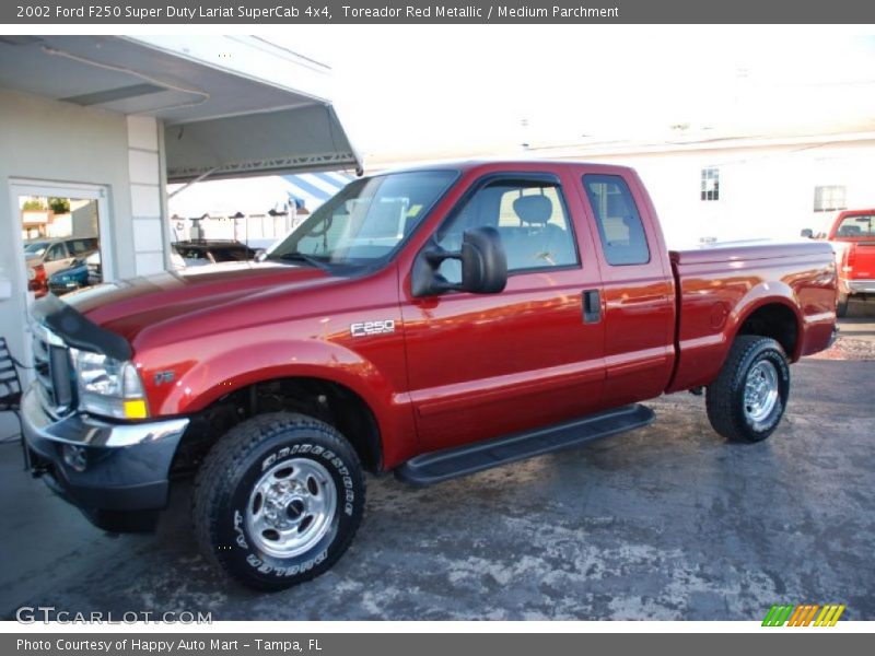 Front 3/4 View of 2002 F250 Super Duty Lariat SuperCab 4x4