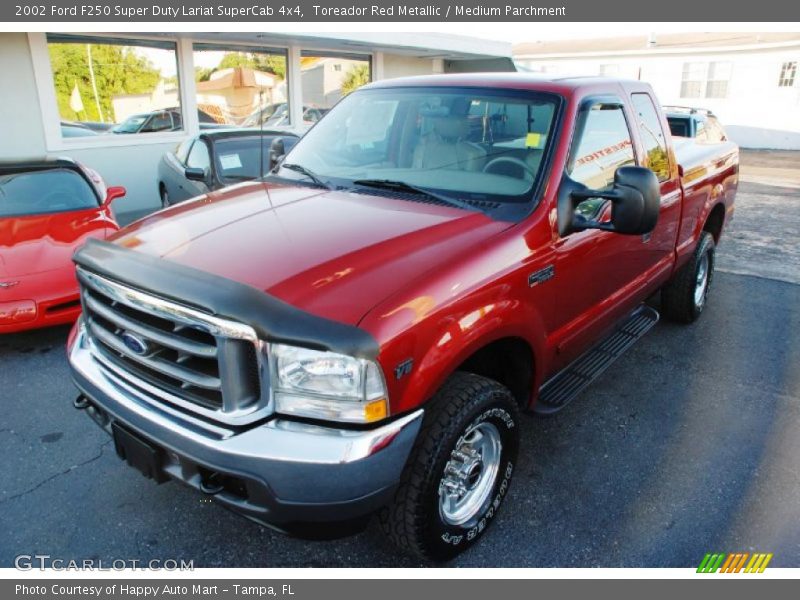 Toreador Red Metallic / Medium Parchment 2002 Ford F250 Super Duty Lariat SuperCab 4x4