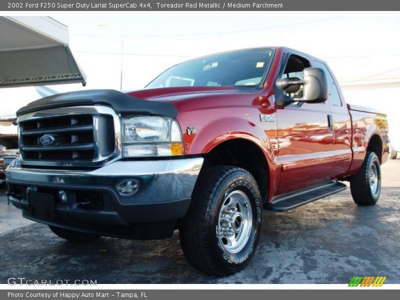 Toreador Red Metallic / Medium Parchment 2002 Ford F250 Super Duty Lariat SuperCab 4x4