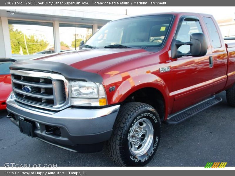 Toreador Red Metallic / Medium Parchment 2002 Ford F250 Super Duty Lariat SuperCab 4x4
