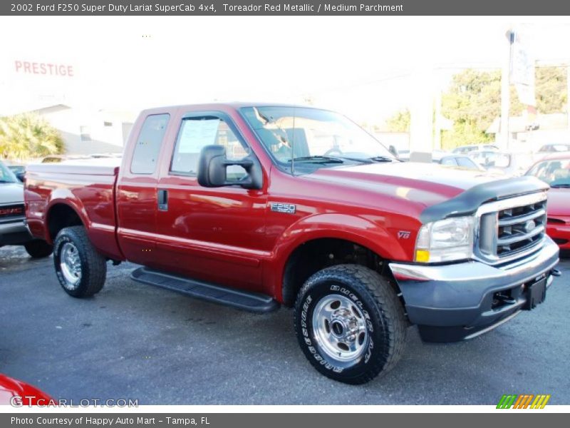 Toreador Red Metallic / Medium Parchment 2002 Ford F250 Super Duty Lariat SuperCab 4x4
