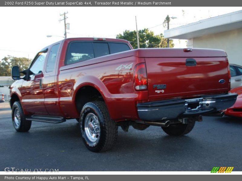 Toreador Red Metallic / Medium Parchment 2002 Ford F250 Super Duty Lariat SuperCab 4x4