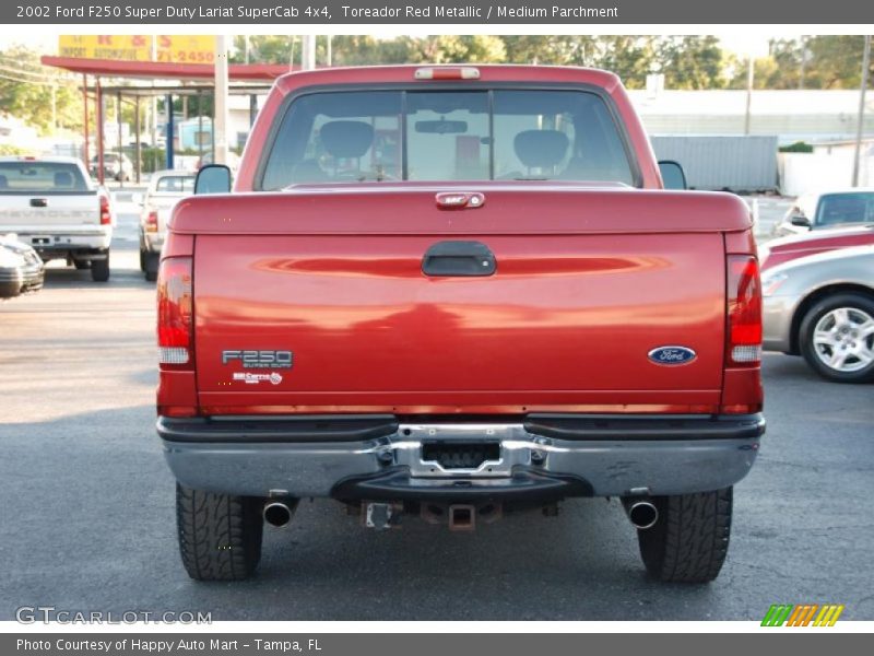 Toreador Red Metallic / Medium Parchment 2002 Ford F250 Super Duty Lariat SuperCab 4x4
