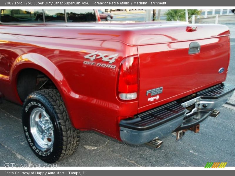 Toreador Red Metallic / Medium Parchment 2002 Ford F250 Super Duty Lariat SuperCab 4x4