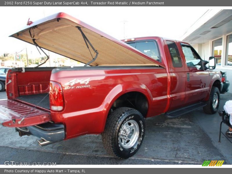 Toreador Red Metallic / Medium Parchment 2002 Ford F250 Super Duty Lariat SuperCab 4x4
