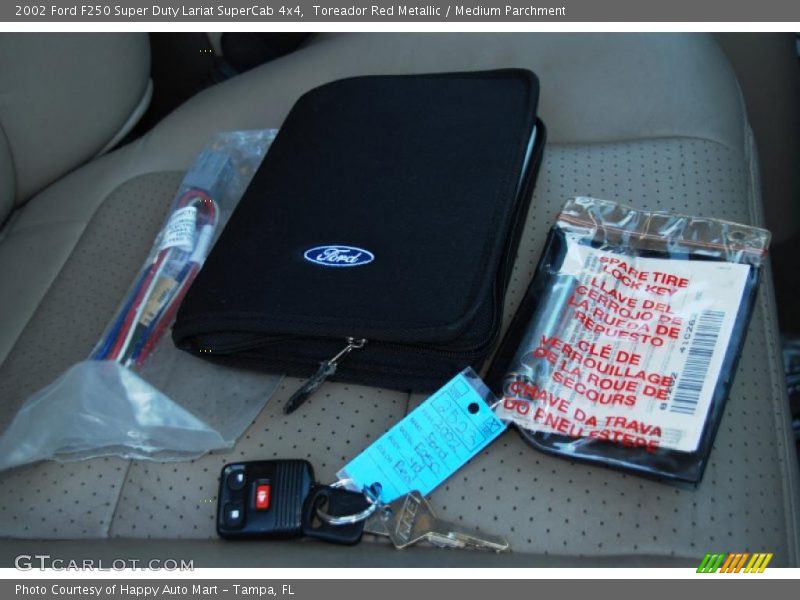 Toreador Red Metallic / Medium Parchment 2002 Ford F250 Super Duty Lariat SuperCab 4x4