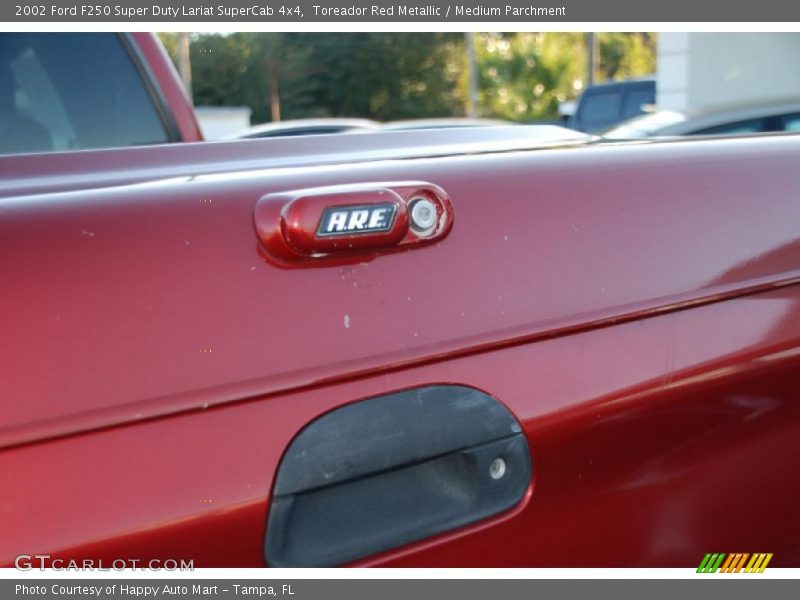 Toreador Red Metallic / Medium Parchment 2002 Ford F250 Super Duty Lariat SuperCab 4x4