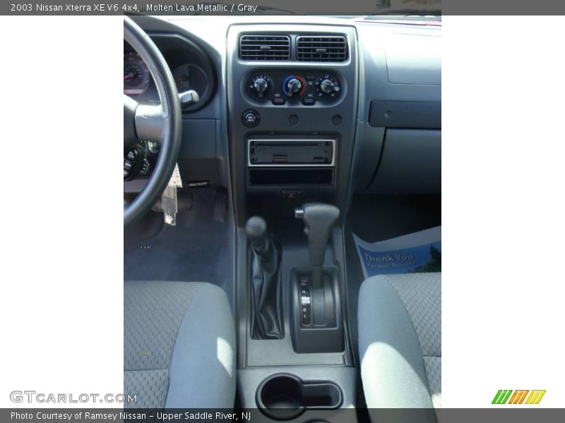 Molten Lava Metallic / Gray 2003 Nissan Xterra XE V6 4x4