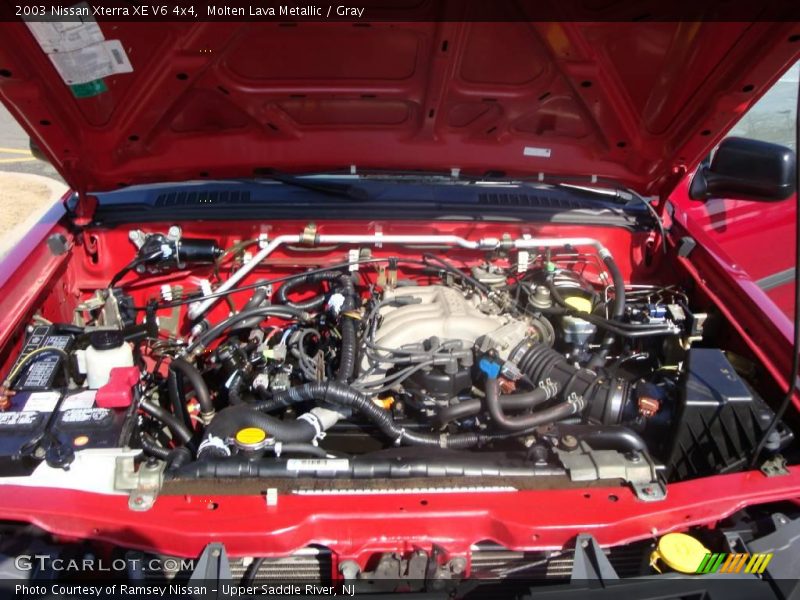 Molten Lava Metallic / Gray 2003 Nissan Xterra XE V6 4x4