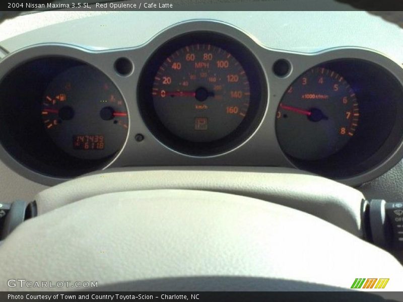 Red Opulence / Cafe Latte 2004 Nissan Maxima 3.5 SL