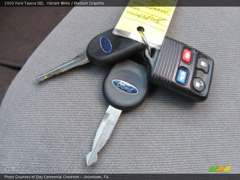 Vibrant White / Medium Graphite 2003 Ford Taurus SES