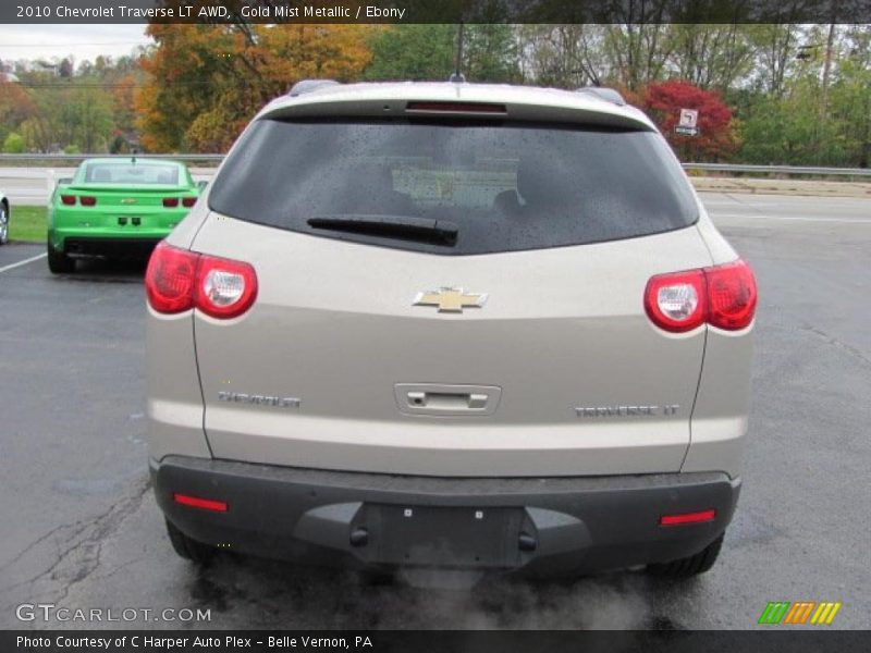 Gold Mist Metallic / Ebony 2010 Chevrolet Traverse LT AWD