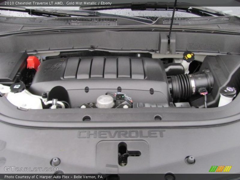 Gold Mist Metallic / Ebony 2010 Chevrolet Traverse LT AWD