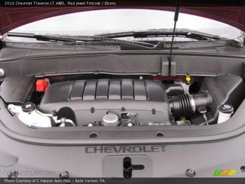 Red Jewel Tintcoat / Ebony 2010 Chevrolet Traverse LT AWD