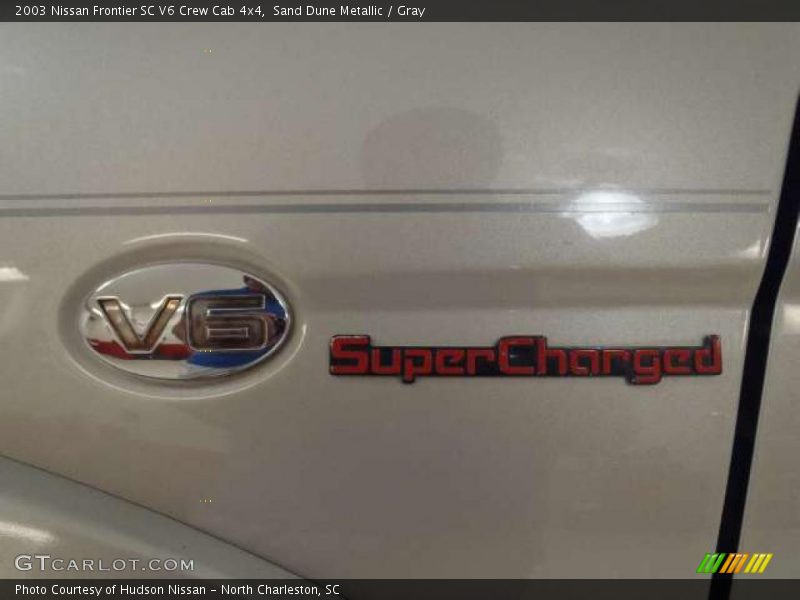  2003 Frontier SC V6 Crew Cab 4x4 Logo