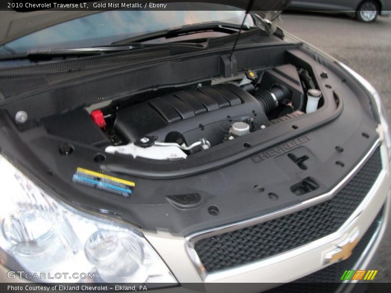 Gold Mist Metallic / Ebony 2010 Chevrolet Traverse LT