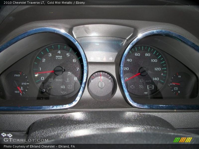 Gold Mist Metallic / Ebony 2010 Chevrolet Traverse LT